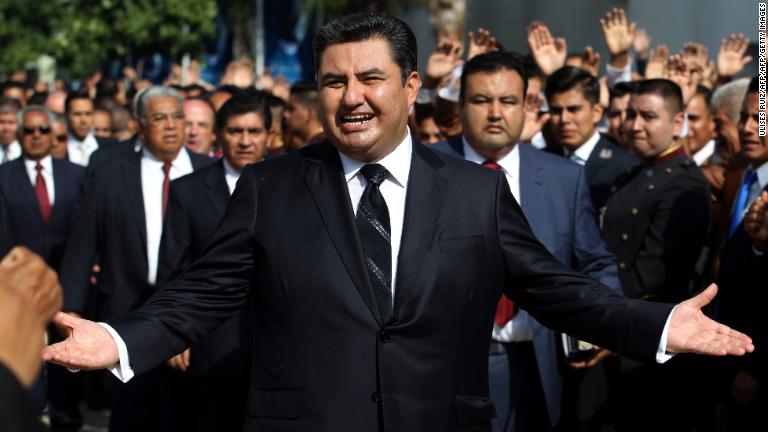This picture taken on August 9, 2017 shows the leader of the Church of the Light of the World, Naason Joaquin Garcia, walking among his parishioners in Guadalajara, Mexico. - The leader of La Luz Del Mundo, an international religious organization based in Mexico, has been arrested in California on charges of human trafficking, child rape and other felonies, authorities said on June 4, 2019. Naason Joaquin Garcia, who heads the organization that claims one million followers worldwide, and three co-defendants allegedly committed 26 felonies in southern California between 2015 and 2018. (Photo by ULISES RUIZ / AFP)ULISES RUIZ/AFP/Getty Images