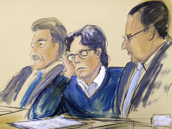 In this courtroom artist's sketch, defendant Keith Raniere (center) sits with his attorneys, Paul DerOhannesian (left) and Marc Agnifilo during closing arguments Tuesday in federal court in Brooklyn, N.Y.
