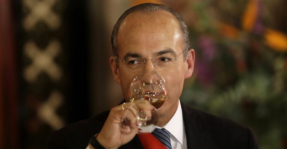 Mexico's President Felipe Calderon drinks a glass of wine while toasting during his last state dinner in Mexico City, Friday, Nov. 30, 2012. The party that ruled Mexico for seven decades returns to power Saturday with a president from a new generation to govern a country that has changed dramatically in the 12 years since the Institutional Revolutionary Party last held the top post. (AP Photo/Dario Lopez-Mills)