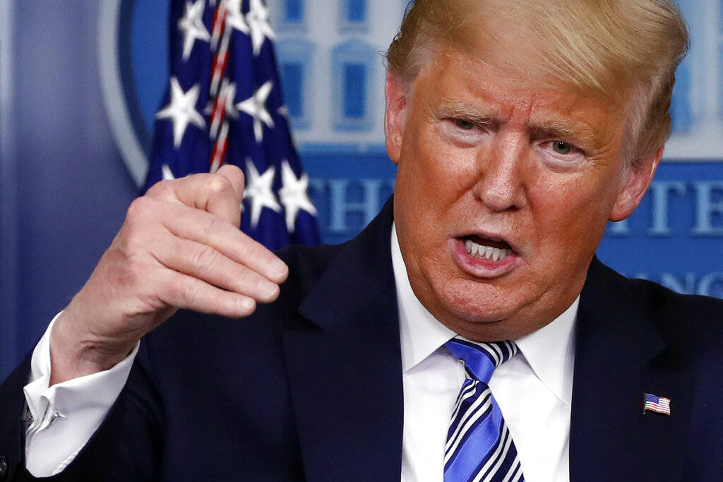 President Donald Trump speaks about the coronavirus in the James Brady Briefing Room, Monday, March 23, 2020, in Washington. (AP Photo/Alex Brandon)