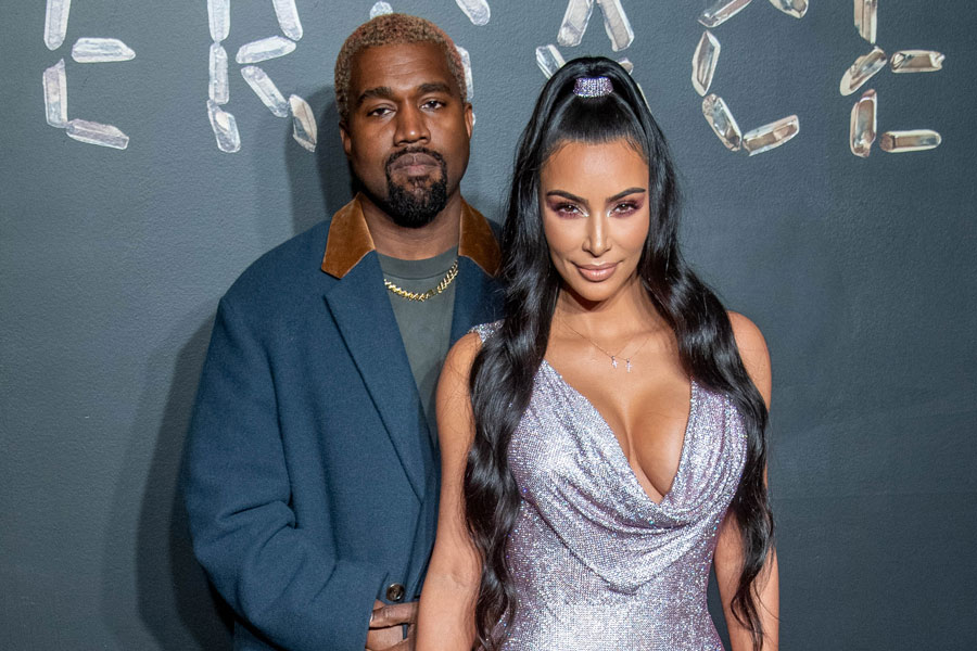 NEW YORK, NEW YORK - DECEMBER 02: Kanye West and Kim Kardashian West attend the the Versace fall 2019 fashion show at the American Stock Exchange Building in lower Manhattan on December 02, 2018 in New York City. (Photo by Roy Rochlin/Getty Images)